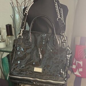 Badgley Mishka black patent leather bag. Long Chan and zip bottom. Never worn.